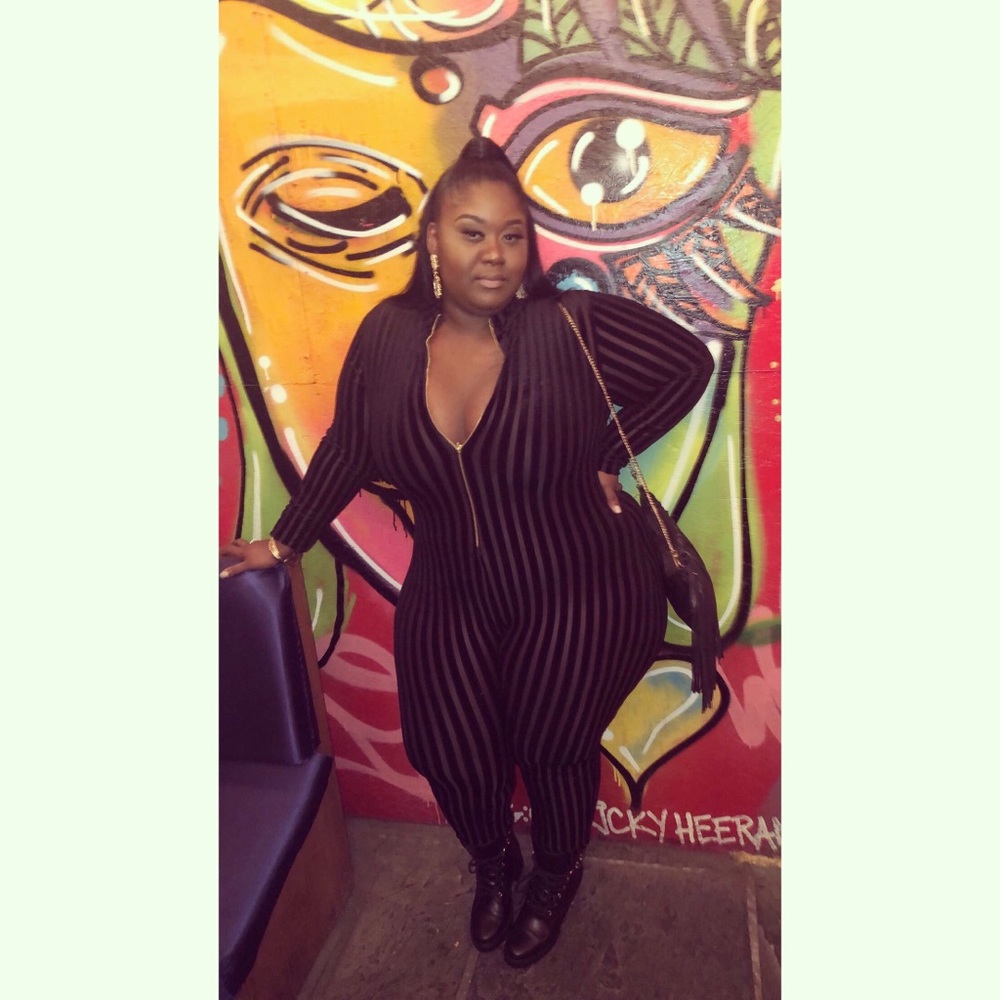Gitionline Velvet and sheer striped jumpsuit with gold zipper detail
